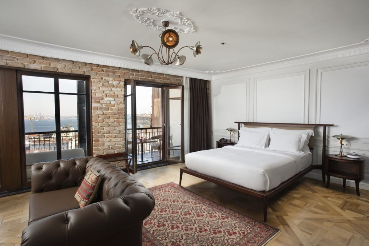 Bosphorus suite interior with arched window onto the strait