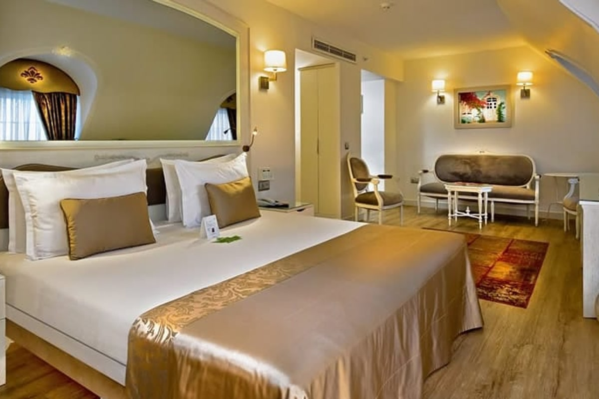 Sultan suite with Ottoman-styled headboard.